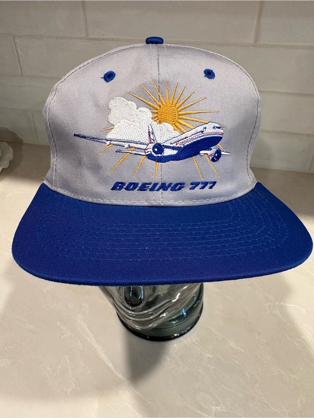 Boeing 777 Embroidered Trucker Hat in Blue and Light Gray Embroidered